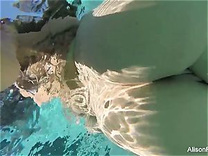 curvaceous Alison swims and jerks in the pool