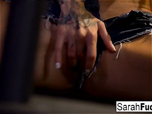Sara Jessie drains in a jail box